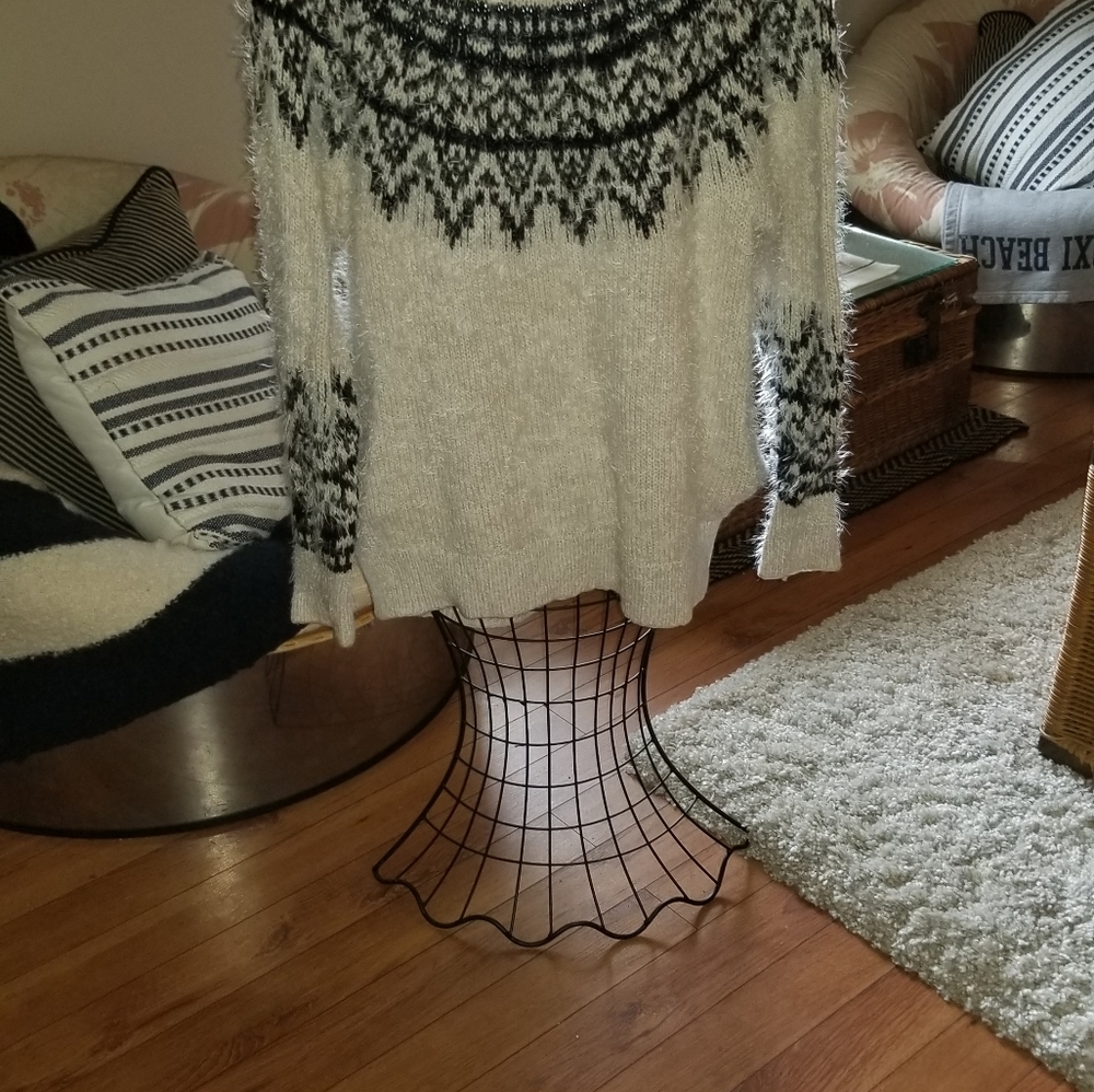 Cream fuzzy sweater.